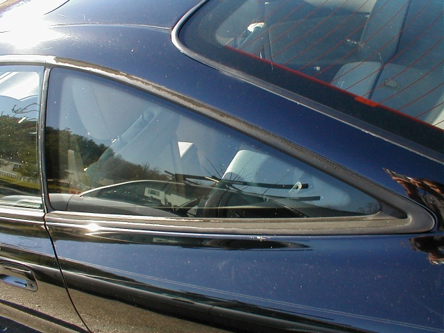 I have seen pictures of lots of really, really, super nice MX-6s recently... This, however, is something that they all have in common. Dry-rotted, pitted, ugly, faded rear window trim.