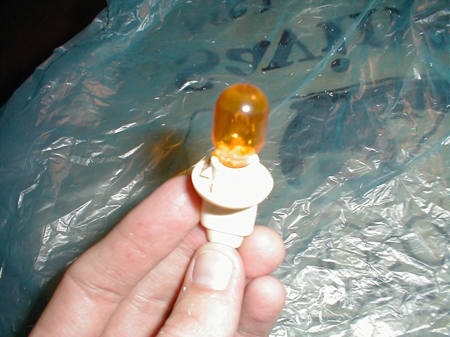 It's kind of hard to see from the picture, but around the base of the socket is a flexible rubber ring. Inside of that are four raised bumps (hence, a plus sign)